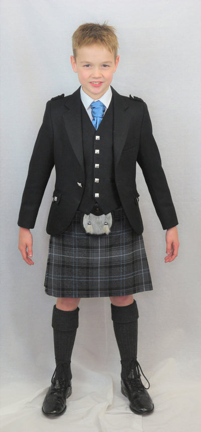 Boys Black Argyll kilt hire outfit with Highland Granite Blue tartan kilt. Available to hire from Anderson Kilts Dumfries