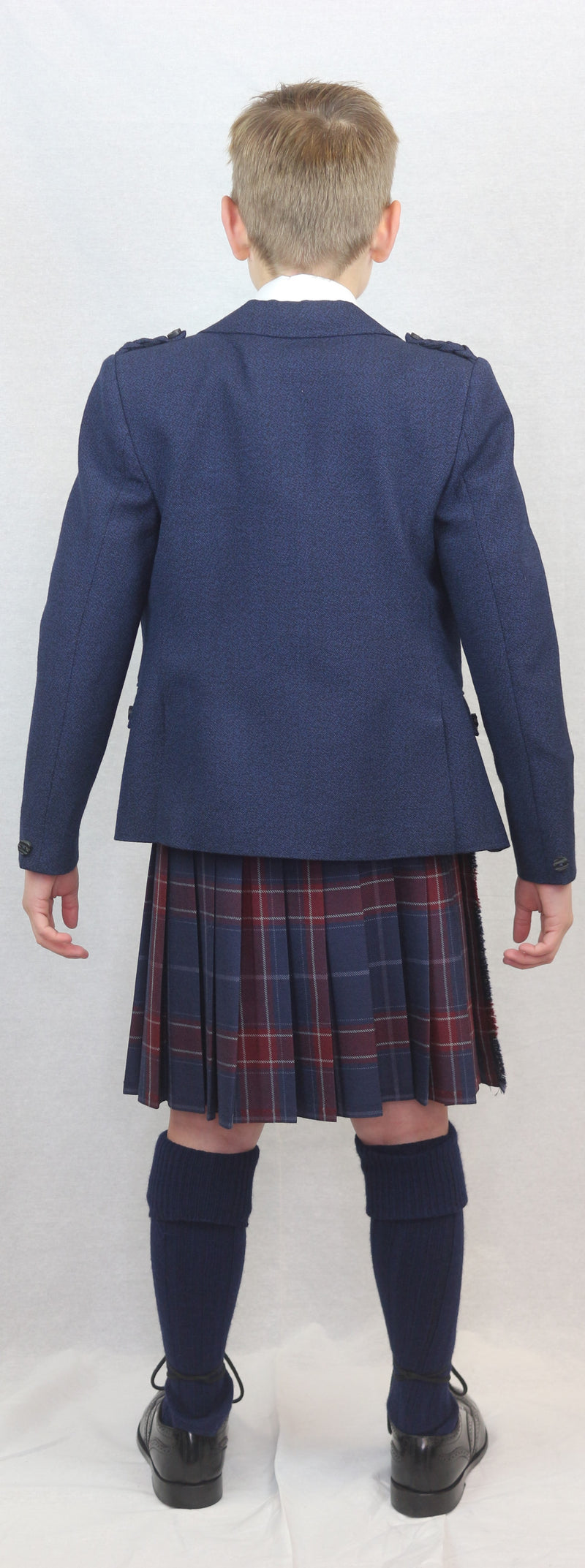Back image of Boys navy crail kilt hire outfit with Queen of the South tartan. Available from Anderson Kilts Dumfries
